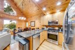 Newly Renovated Kitchen with Granite Countertops & Stainless Steel Appliances